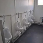 Kontener sanitarny toaletowy 20′ socjalny – toalety, pisuary, umywalki